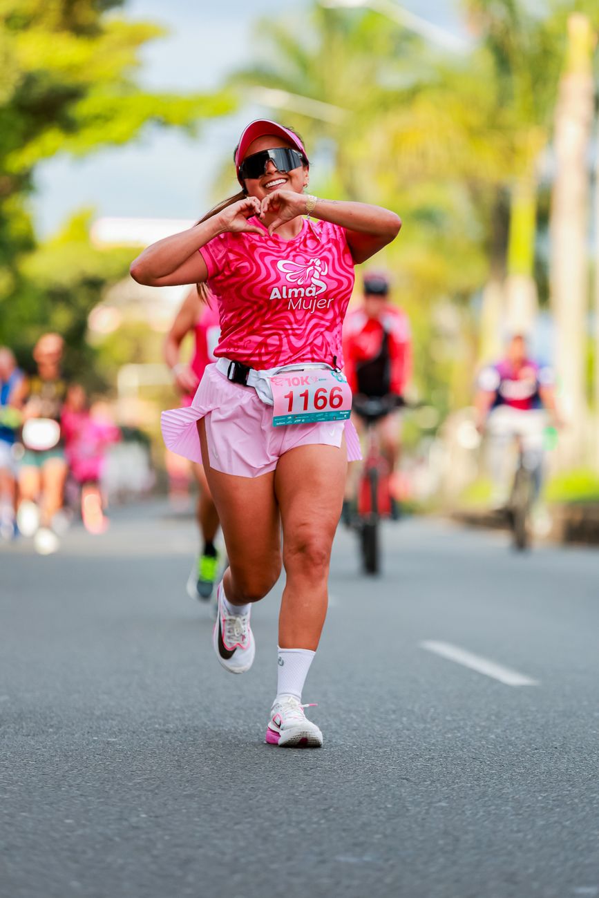 female runner in pink during outdoor race